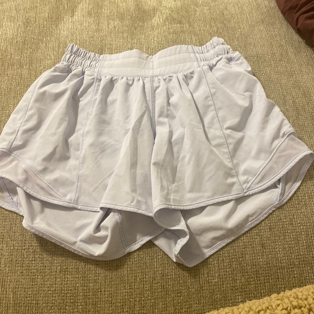 Lululemon size four Hotty hot 2.5 inseam. Light purple/ lilac. Worn 5-10 times